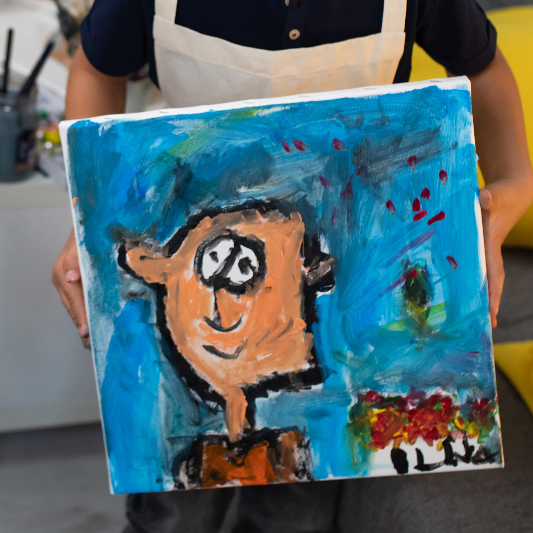 zdjęcie przedstawia obraz olejny z namalowaną twarzą człowieka